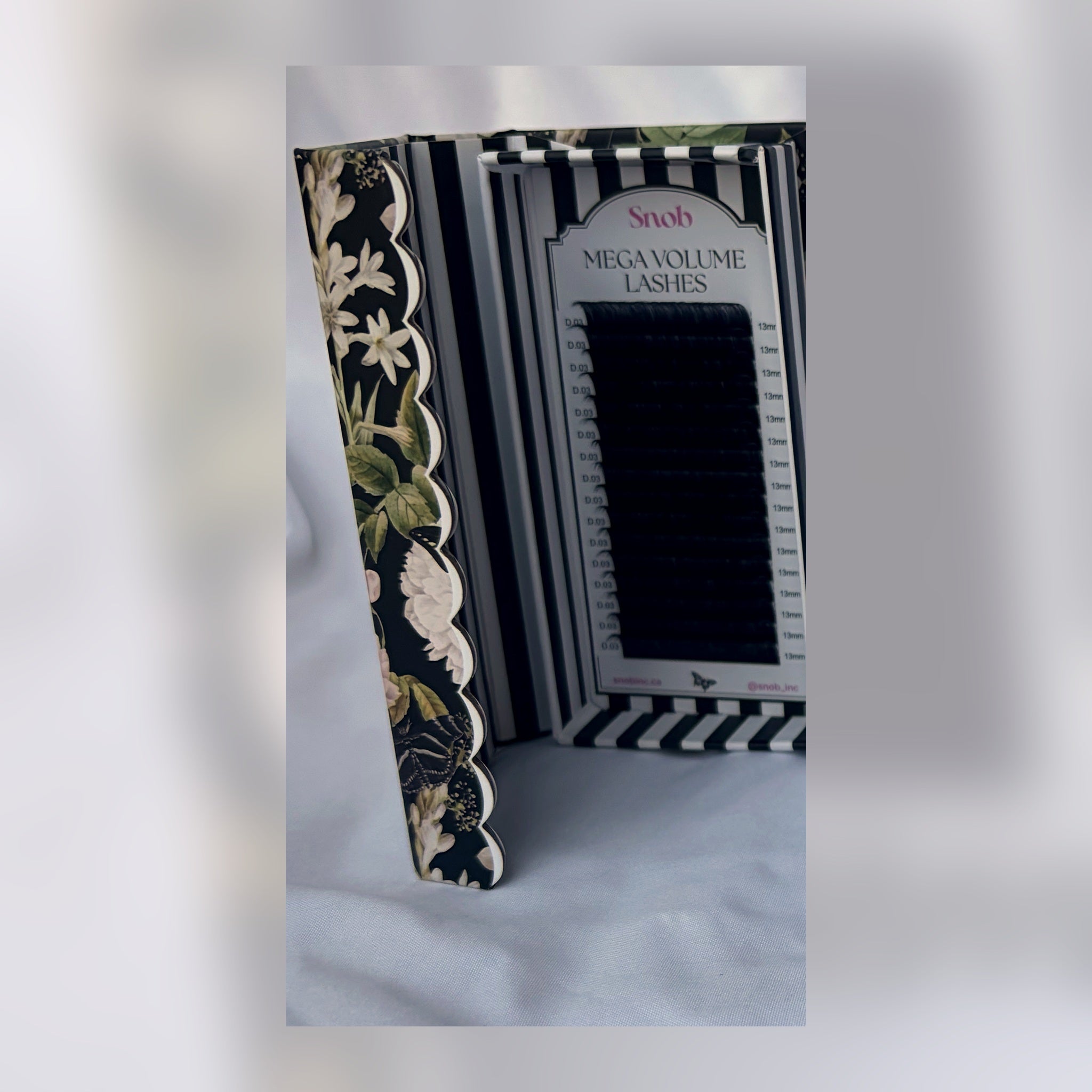 SNOB mega volume opened lash tray packaging example; sample 0.03 mm lashes shown